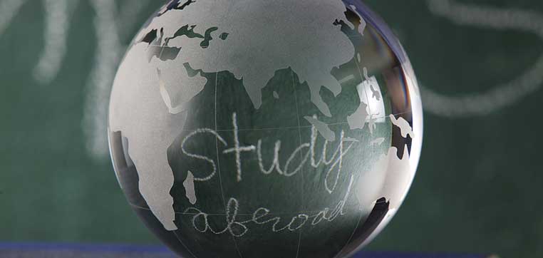 Globe with writing representing 4-1-4 academic calendars