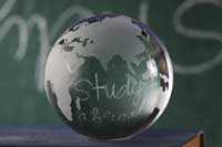 Globe with study abroad on it representing 4-1-4 academic calendars