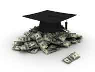 graduation hat on money representing college recruiting scholarships