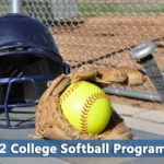 Softball glove and ball representing d2 softball colleges