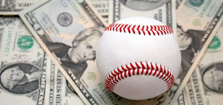 baseball dollar bills representing how much d1 colleges spend on baseball