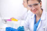student in lab representing colleges with most science majors