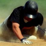 player sliding into base representing ways to get smart about college baseball recruiting