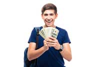 student with money from colleges for national merit scholarships
