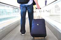 student with suitcase representing colleges with most geographic diversity