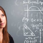 Student in front of chalkboard with equations representing how to estimate odds of an athletic scholarship
