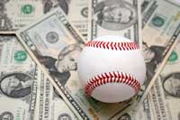Baseball and money representing which college spend the most on d1 baseball
