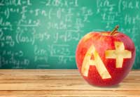 apple and chalkboard representing good grades won't get you a great scholarship