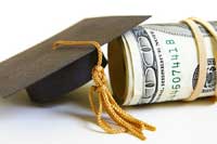 money and graduation hat representing colleges for high income families