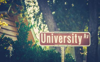 University road sign representing 50-50 colleges
