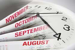 calendar and clock representing college softball recruiting timeline