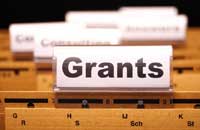 file folder titled "grants" representing colleges providing the most financial aid by state